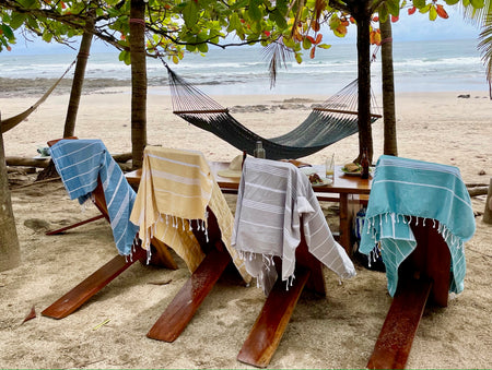 striped colorful turkish towels on beach chairs